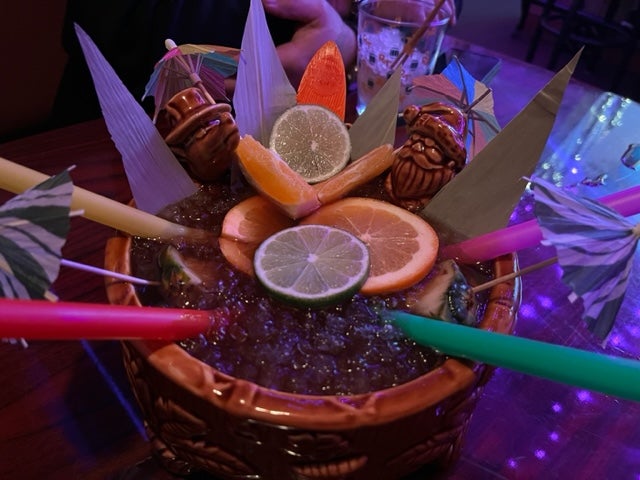 Royal Tot tiki drink with multiple straws