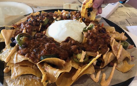 longboard nachos on a platter