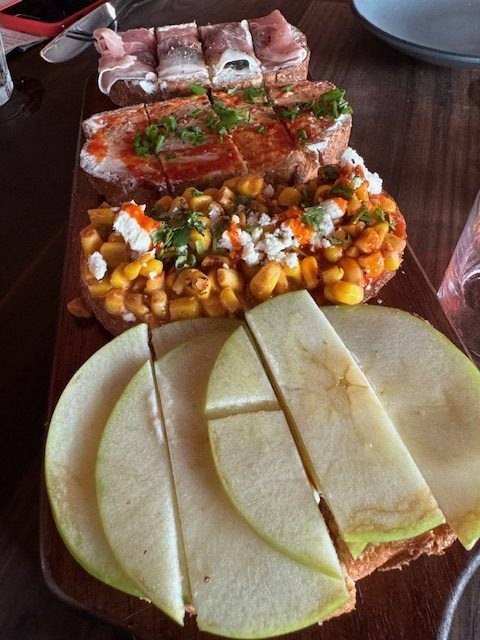 a bruschetta board at Postino at the bowl at Ballantyne